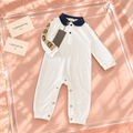 Cream Polo Romper with Navy Collar