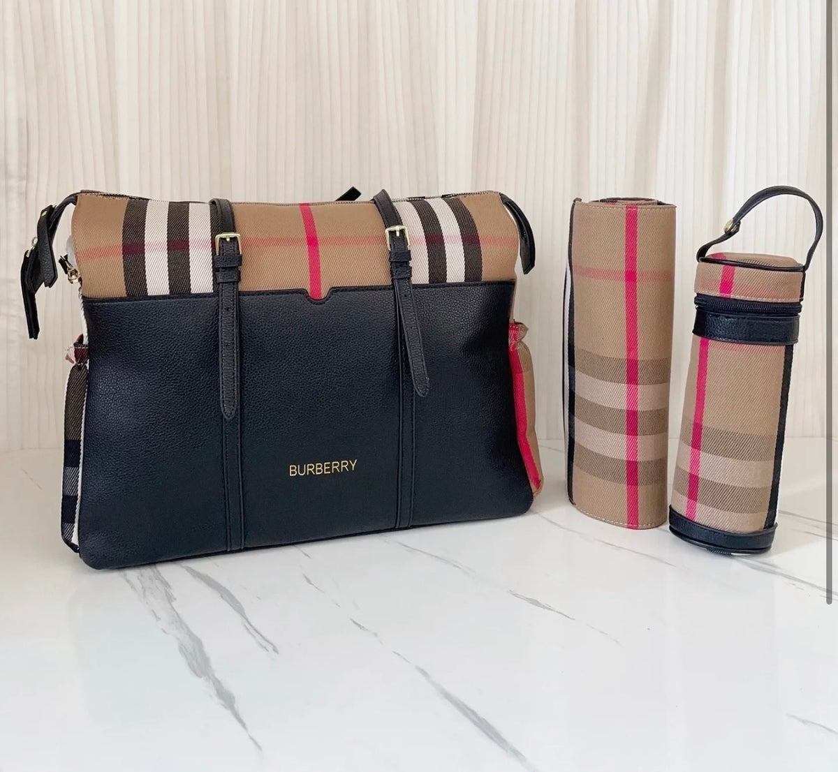 Black and chequered changing bag