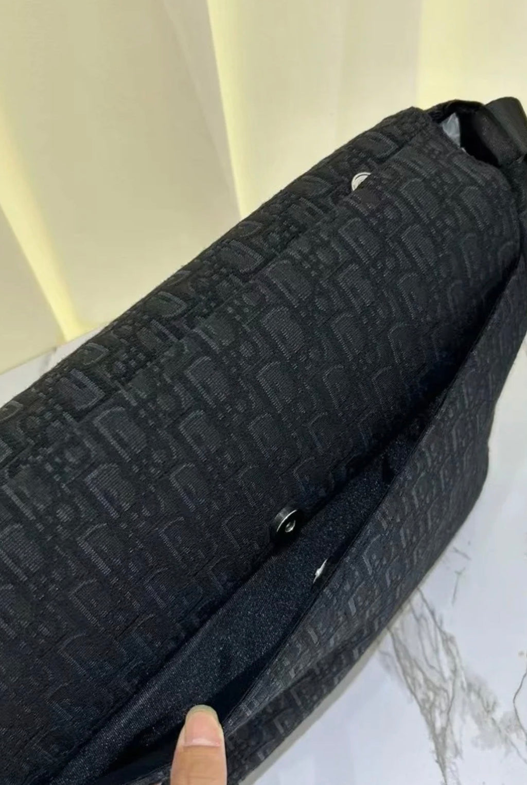 Black buckle changing bag