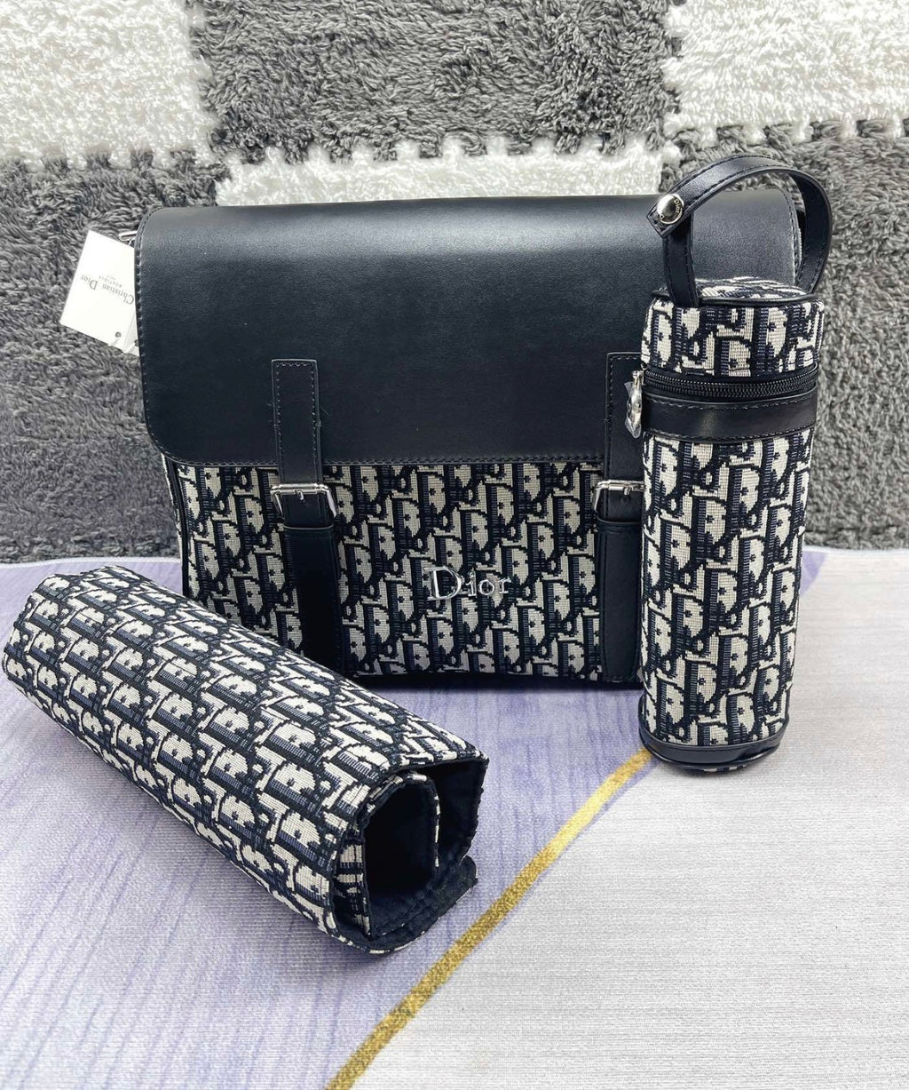 Black and patterned changing bag