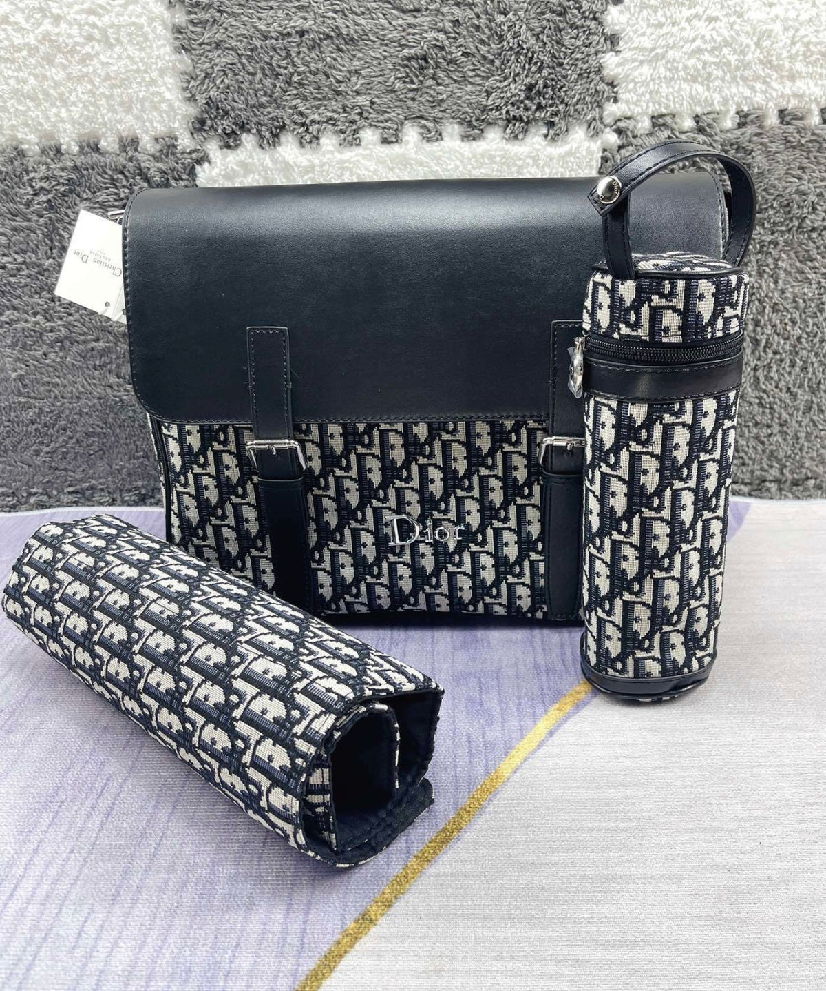 Black and patterned changing bag