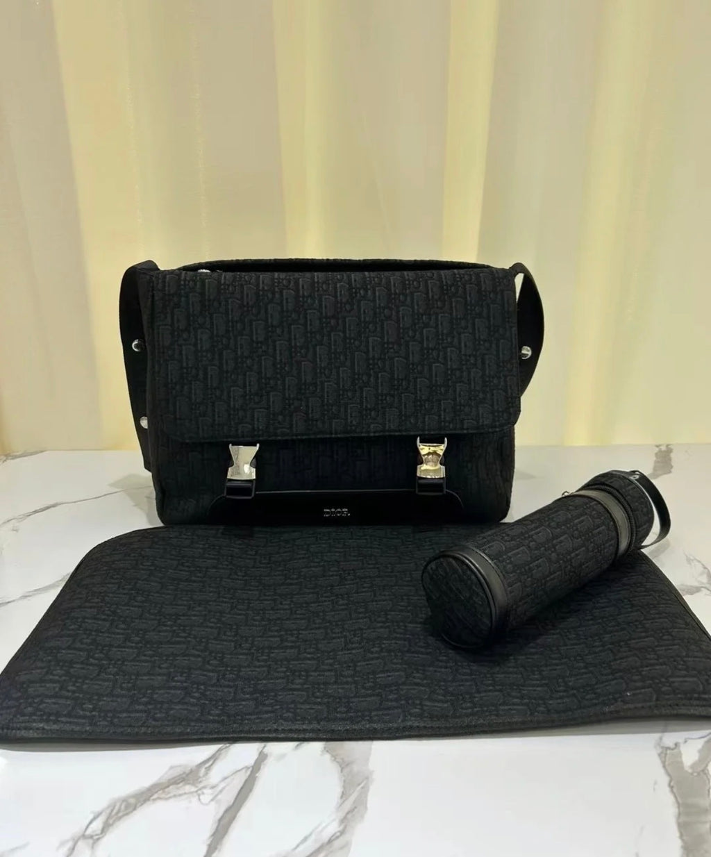 Black buckle changing bag