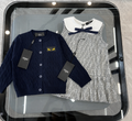 Patterned Jumper and Skirt Set
