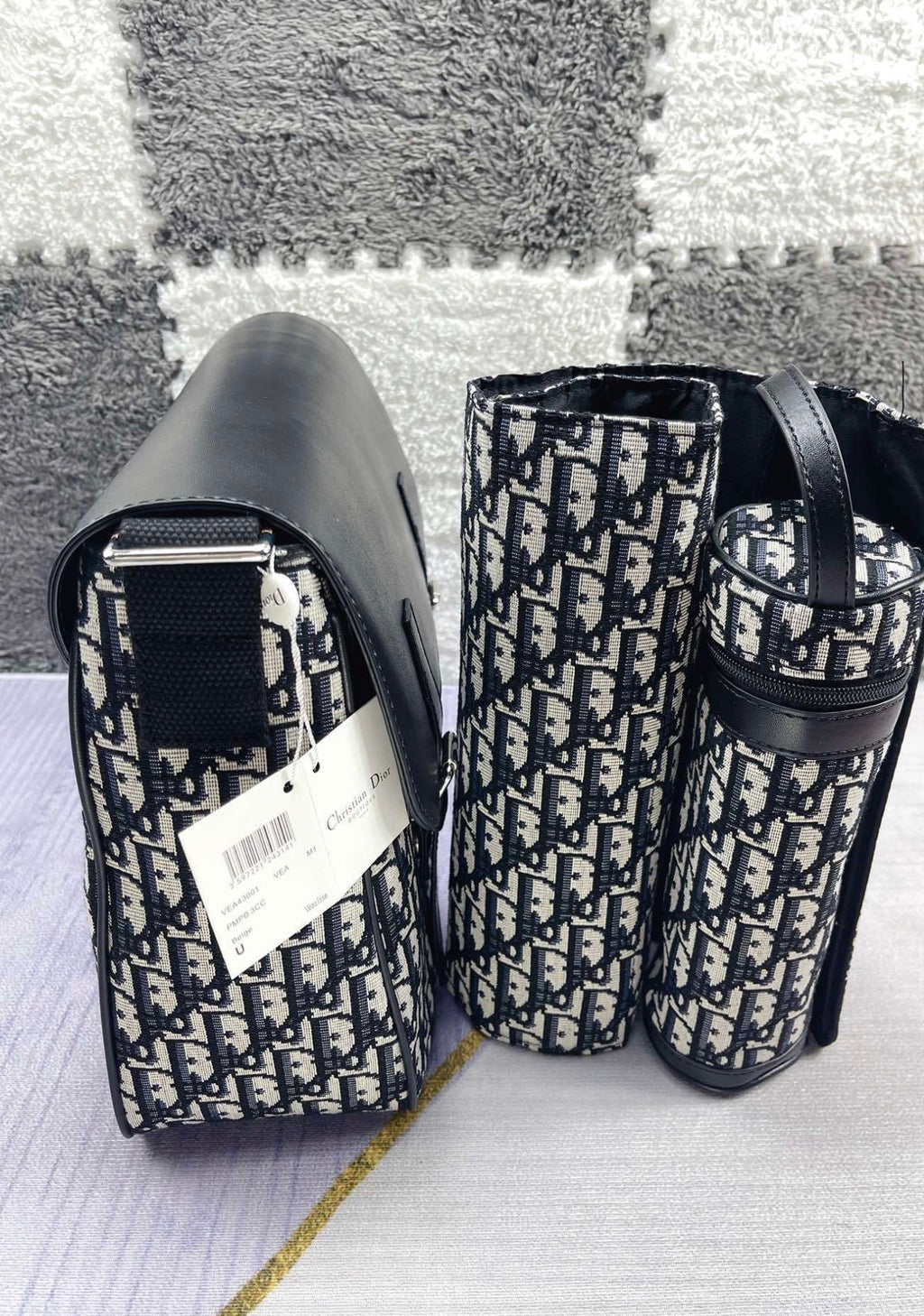 Black and patterned changing bag