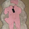 Pink baby romper and bib set