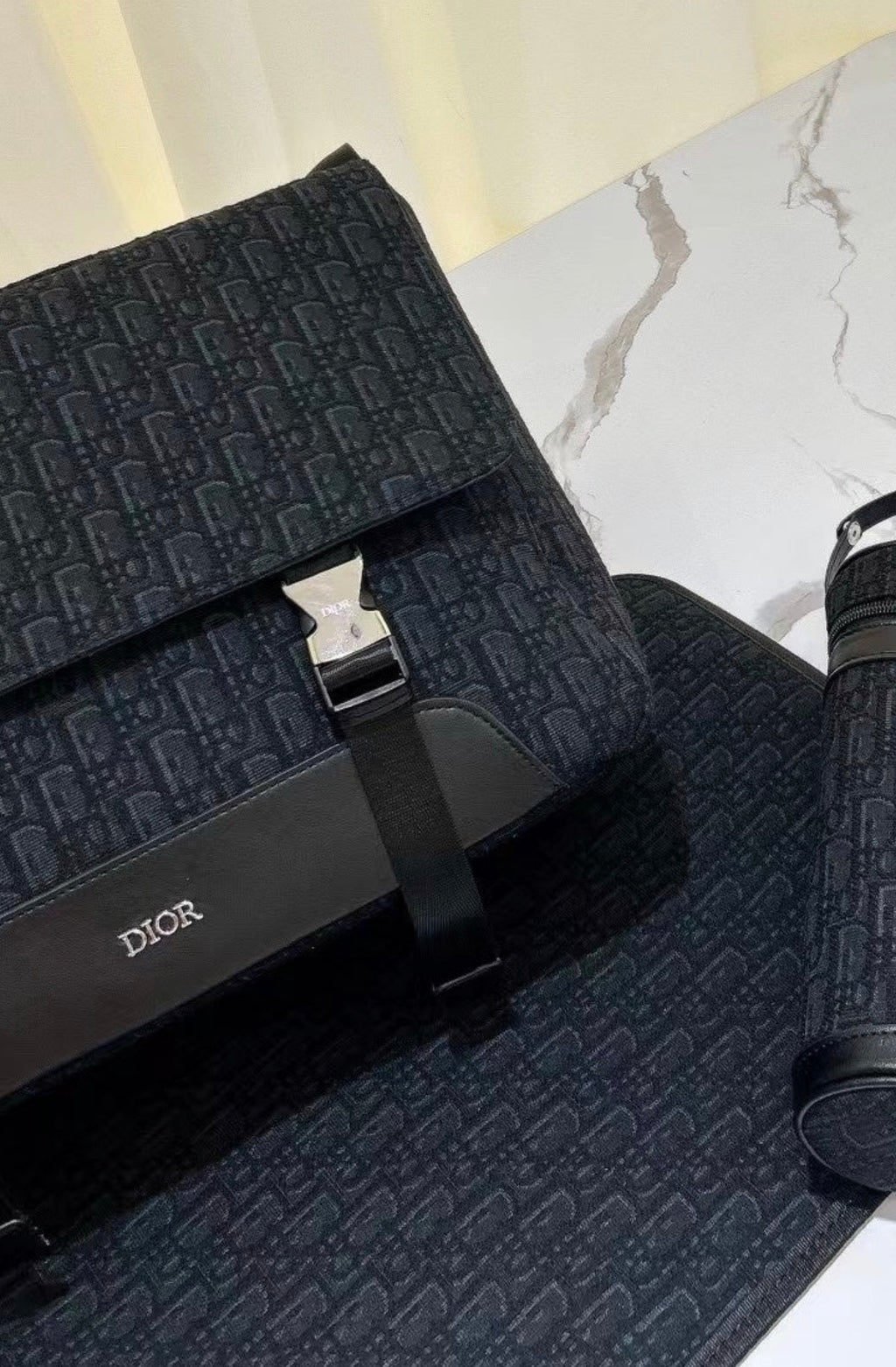 Black buckle changing bag