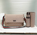 Monogram green and red strap baby bag