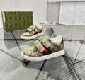 Beige red strap monogram shoes