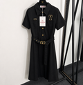 Black dress with gold v